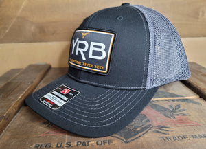 YRB Black Patch | R-Flex Adjustable Trucker | Richardson 112+ | Black/Graphite
